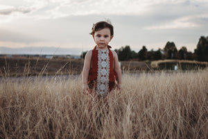 little girl romper burnt orange